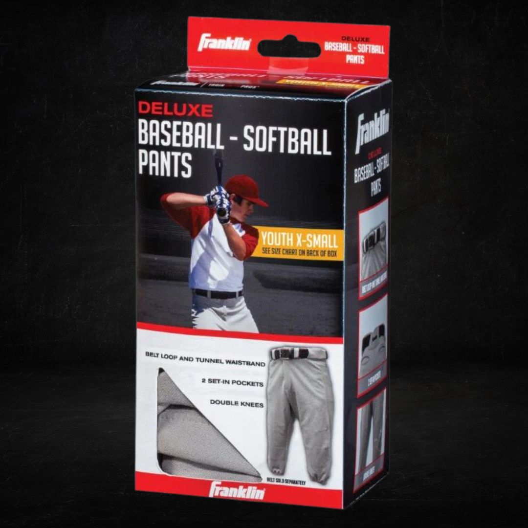 Packaging for Franklin Deluxe Baseball-Softball Pants in youth x-small, featuring belt loop and tunnel waistband, 2 set-in pockets, and double knees for durability, displayed in front of a baseball player image.